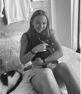 Picture of a student with a cat